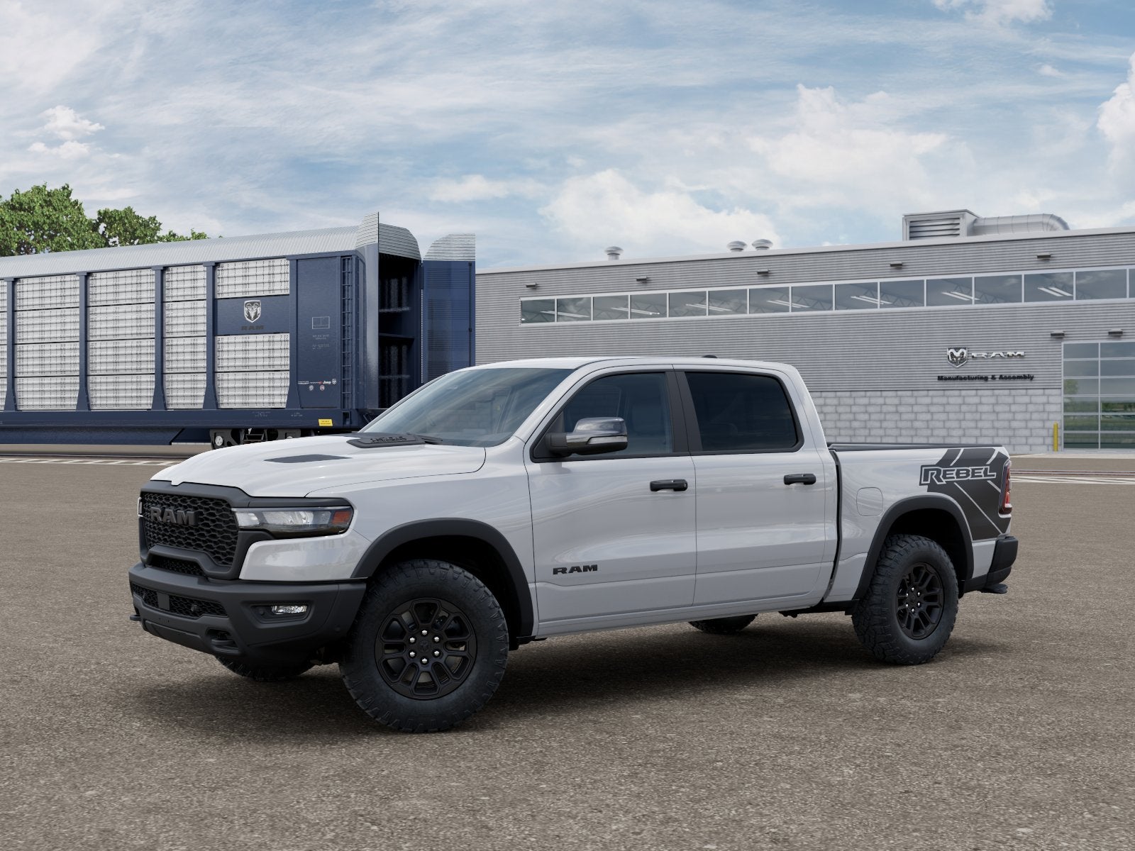 2026 RAM 1500 RAM 1500 REBEL CREW CAB 4X4 5'7' BOX in Bright White Clear-Coat Exterior Paint — front three-quarter view