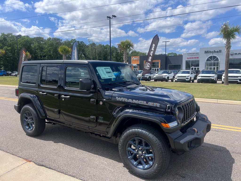 2026 Jeep Wrangler WRANGLER 4-DOOR 85TH ANNIVERSARY EDITION in Black Clear-Coat Exterior Paint — front three-quarter view