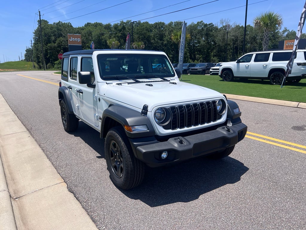 2026 Jeep Wrangler WRANGLER 4-DOOR SPORT in Bright White Clear-Coat Exterior Paint — front three-quarter view