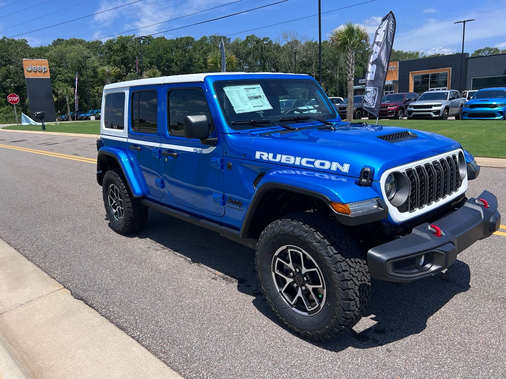 2026 Jeep Wrangler WRANGLER 4-DOOR RUBICON in Hydro Blue Pearl-Coat Exterior Paint — front three-quarter view