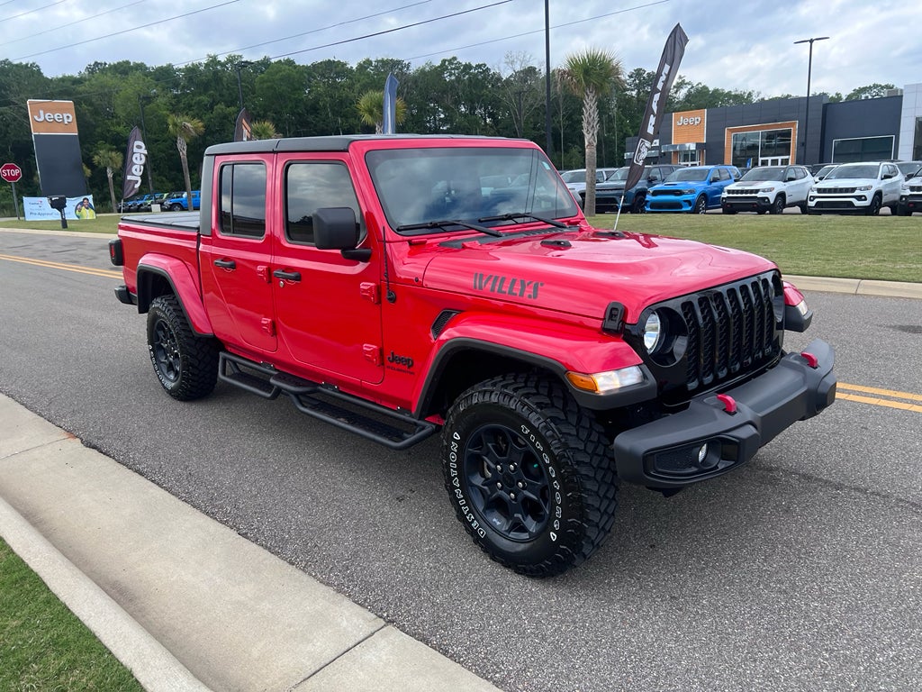 2023 Jeep Gladiator Willys in Firecracker Red Clearcoat — front three-quarter view