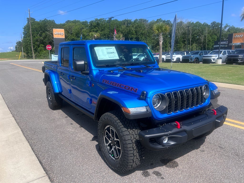 2026 Jeep Gladiator GLADIATOR RUBICON X 4X4 in Hydro Blue Pearl-Coat Exterior Paint — front three-quarter view