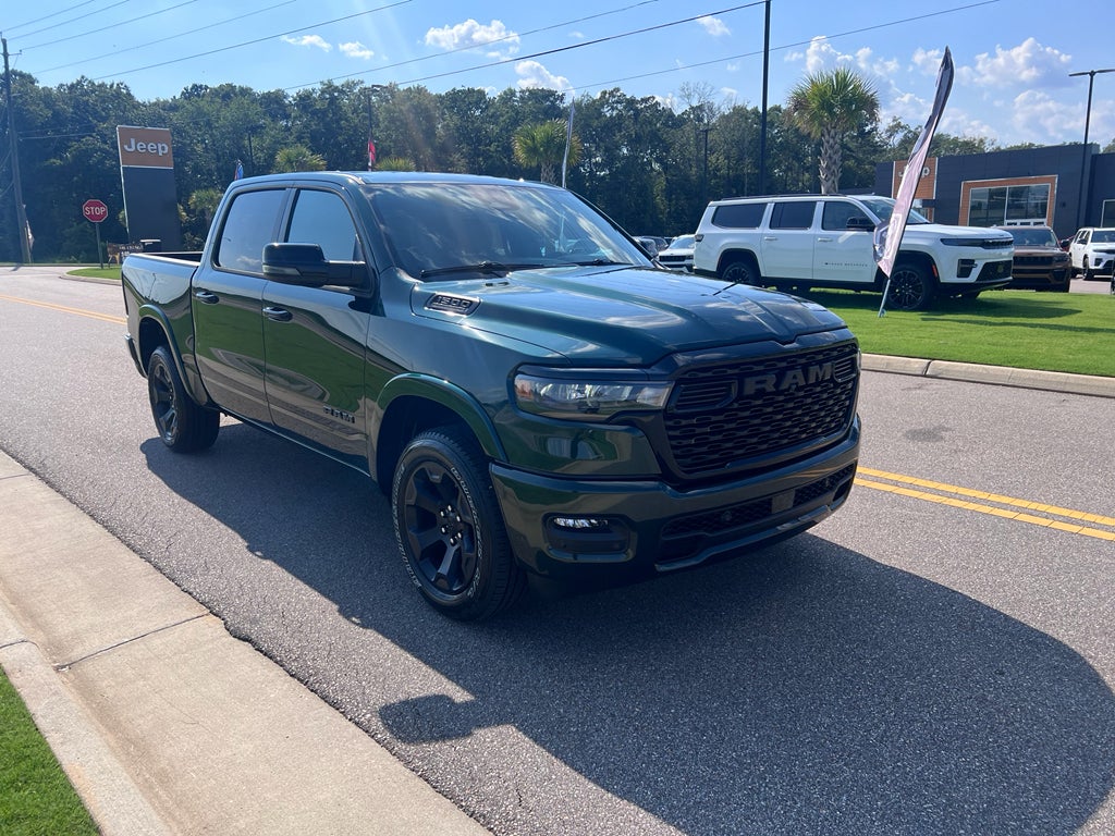 2026 RAM 1500 RAM 1500 BIG HORN CREW CAB 4X2 5'7' BOX in Serrano-Green Metallic Exterior Paint — front three-quarter view