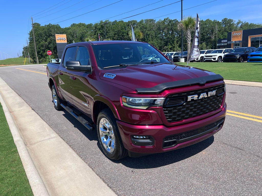 2025 RAM 1500 Big Horn Crew Cab 4x4 5'7' Box in Delmonico Red Pearlcoat — front three-quarter view