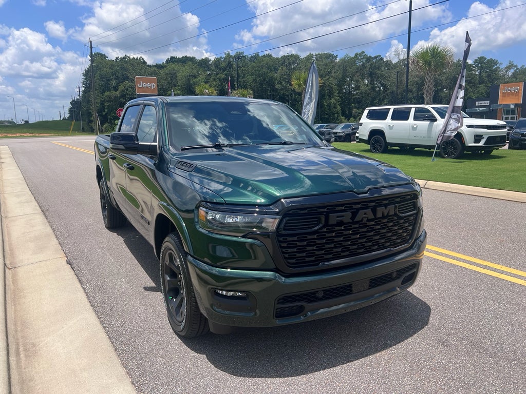 2026 RAM 1500 RAM 1500 BIG HORN CREW CAB 4X4 5'7' BOX in Serrano-Green Metallic Exterior Paint — front three-quarter view