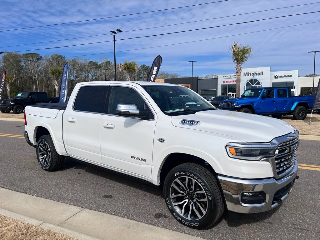2026 RAM 1500 Longhorn in Ivory White Tri-Coat Pearlcoat — front three-quarter view