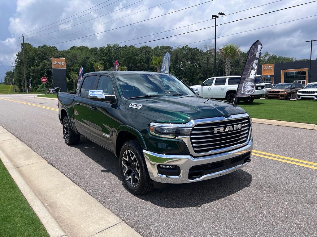 2026 RAM 1500 RAM 1500 LARAMIE CREW CAB 4X4 5'7' BOX in Serrano-Green Metallic Exterior Paint — front three-quarter view
