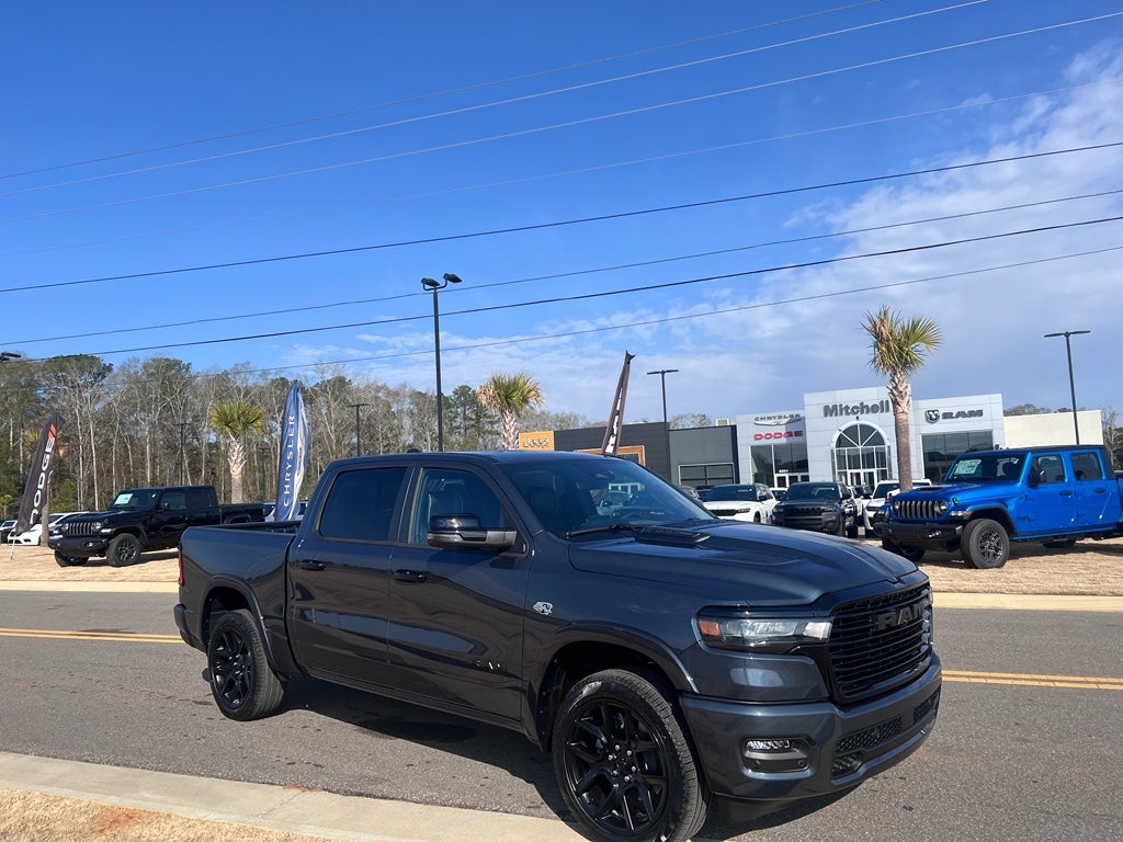 2026 RAM 1500 RAM 1500 LARAMIE CREW CAB 4X4 5'7' BOX in Forged Blue Metallic Exterior Paint — front three-quarter view