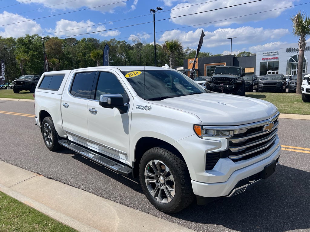 2024 Chevrolet Silverado 4WD Crew Cab Short Bed High Country in Iridescent Pearl Tricoat — front three-quarter view
