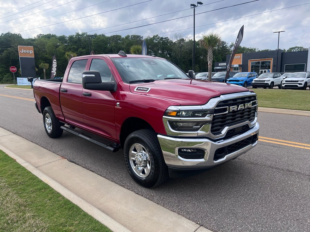 2025 RAM 2500 Tradesman Crew Cab 4x4 6'4' Box in Molten Red Pearlcoat — front three-quarter view