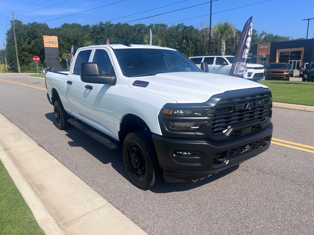 2026 RAM 2500 RAM 2500 TRADESMAN CREW CAB 4X4 6'4' BOX in Bright White Clear-Coat Exterior Paint — front three-quarter view