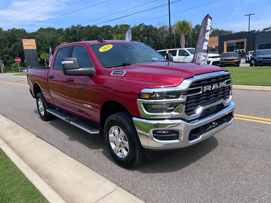 2026 RAM 2500 Big Horn Crew Cab 4x4 6'4' Box in Molten Red Pearlcoat — front three-quarter view